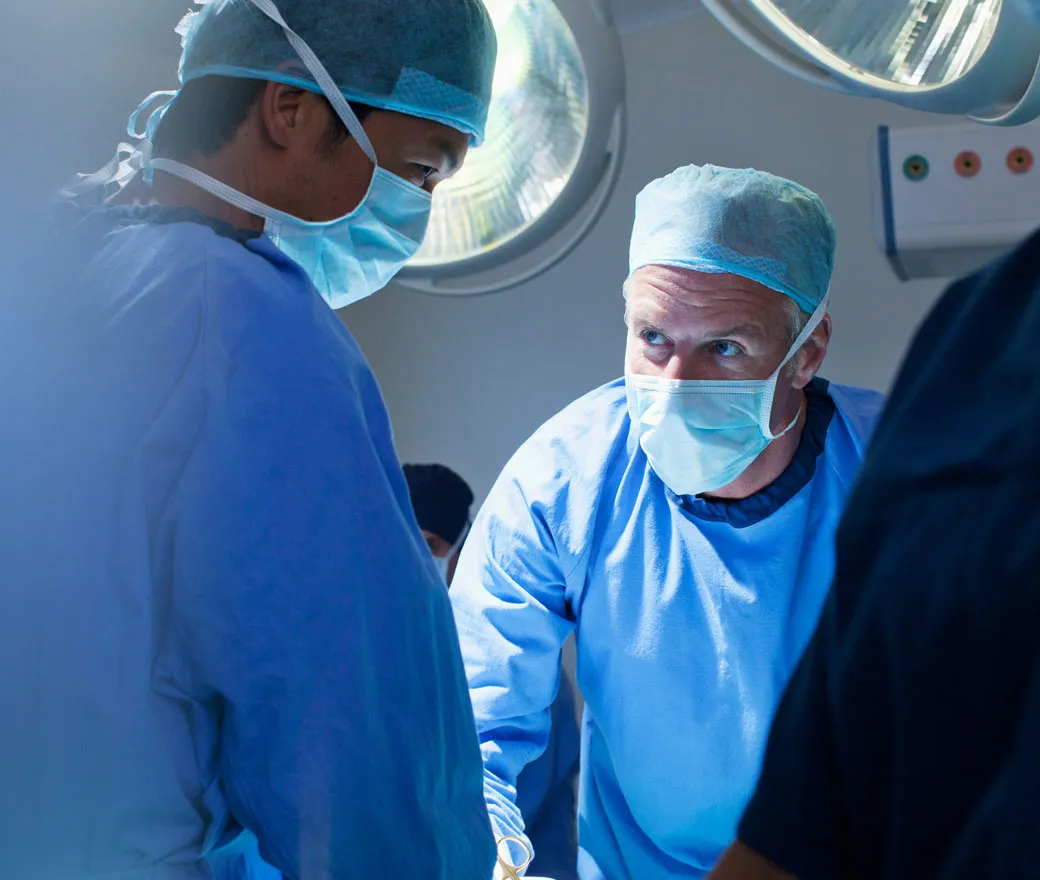 Senior healthcare professionals in an advanced clinical leadership training workshop